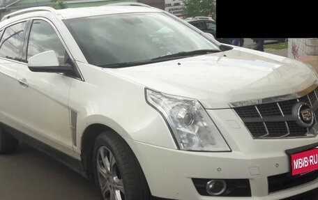 Cadillac SRX II рестайлинг, 2011 год, 1 150 000 рублей, 1 фотография