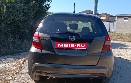 Honda Jazz II рестайлинг, 2012 год, 1 000 000 рублей, 26 фотография