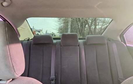 KIA Magentis II рестайлинг, 2010 год, 820 000 рублей, 32 фотография