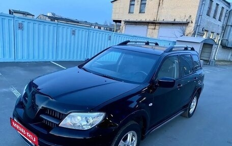 Mitsubishi Outlander III рестайлинг 3, 2007 год, 725 000 рублей, 2 фотография