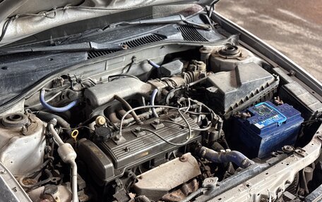 Toyota Avensis III рестайлинг, 1998 год, 160 000 рублей, 13 фотография