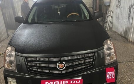 Cadillac SRX II рестайлинг, 2007 год, 670 000 рублей, 3 фотография