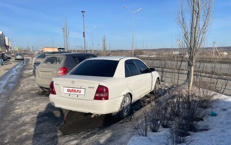 Mazda Familia, 1999 год, 145 000 рублей, 2 фотография