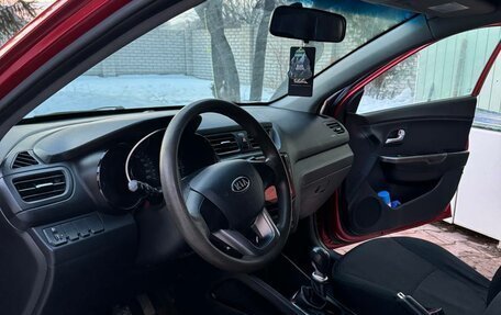 KIA Rio III рестайлинг, 2012 год, 21 фотография