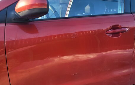 KIA Rio III рестайлинг, 2012 год, 16 фотография