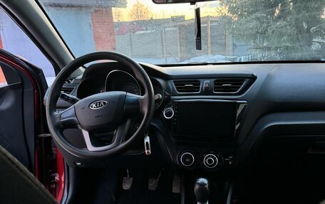 KIA Rio III рестайлинг, 2012 год, 23 фотография