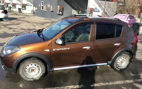 Renault Sandero I, 2013 год, 750 000 рублей, 2 фотография