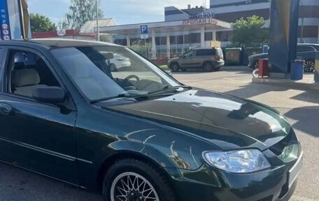 Mazda Protege, 1999 год, 235 000 рублей, 4 фотография