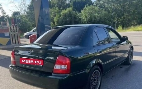 Mazda Protege, 1999 год, 235 000 рублей, 6 фотография