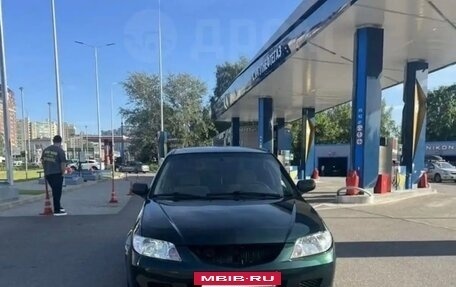 Mazda Protege, 1999 год, 235 000 рублей, 2 фотография