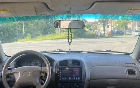 Mazda Protege, 1999 год, 235 000 рублей, 10 фотография