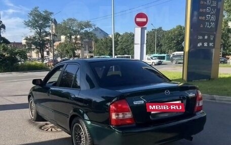 Mazda Protege, 1999 год, 235 000 рублей, 8 фотография