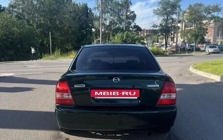 Mazda Protege, 1999 год, 235 000 рублей, 7 фотография