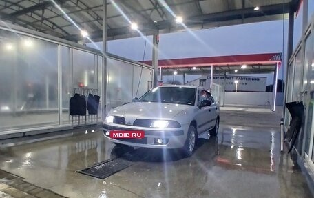 Mitsubishi Carisma I, 1999 год, 450 000 рублей, 10 фотография