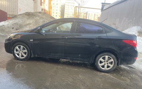 Hyundai Solaris II рестайлинг, 2011 год, 700 000 рублей, 4 фотография