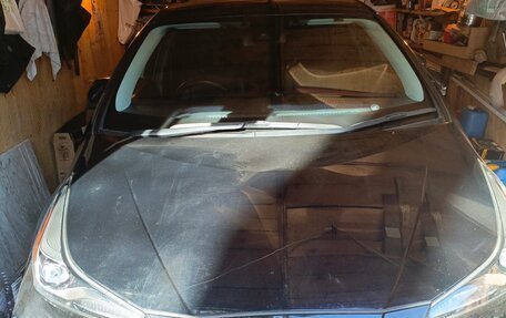 Toyota Prius IV XW50, 2019 год, 1 700 000 рублей, 1 фотография