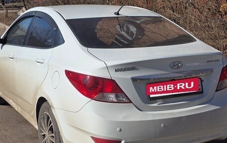 Hyundai Solaris II рестайлинг, 2011 год, 595 000 рублей, 4 фотография