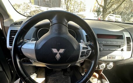 Mitsubishi Outlander III рестайлинг 3, 2010 год, 750 000 рублей, 26 фотография