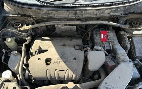 Mitsubishi Outlander III рестайлинг 3, 2010 год, 750 000 рублей, 23 фотография