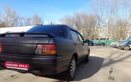 Daihatsu Applause I рестайлинг, 1991 год, 215 000 рублей, 3 фотография