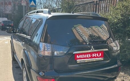 Mitsubishi Outlander III рестайлинг 3, 2011 год, 890 000 рублей, 4 фотография