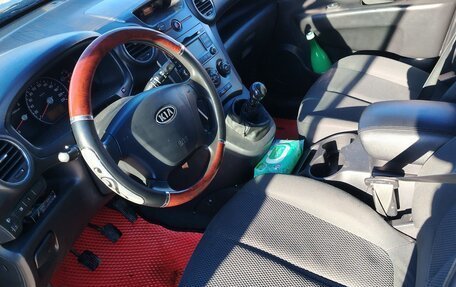 KIA Carens III (RP), 2010 год, 450 000 рублей, 32 фотография