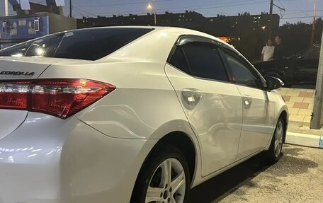 Toyota Corolla, 2013 год, 1 077 000 рублей, 5 фотография