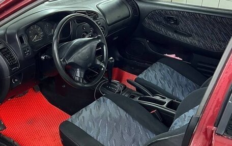 Mitsubishi Mirage VI рестайлинг, 1998 год, 260 000 рублей, 8 фотография