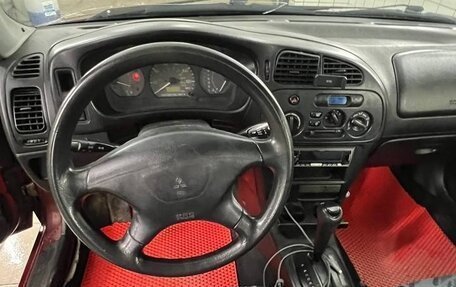 Mitsubishi Mirage VI рестайлинг, 1998 год, 260 000 рублей, 11 фотография