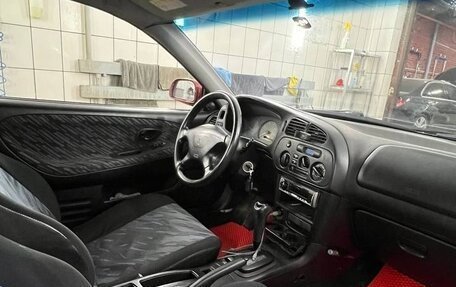 Mitsubishi Mirage VI рестайлинг, 1998 год, 260 000 рублей, 13 фотография