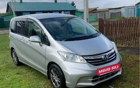 Honda Freed I, 2012 год, 900 000 рублей, 28 фотография