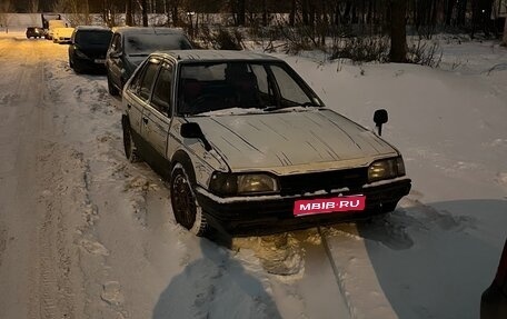 Mazda Familia, 1987 год, 100 000 рублей, 1 фотография