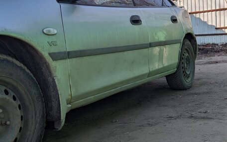 Mazda 323, 1998 год, 277 000 рублей, 7 фотография