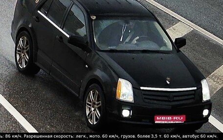 Cadillac SRX II рестайлинг, 2009 год, 750 000 рублей, 1 фотография