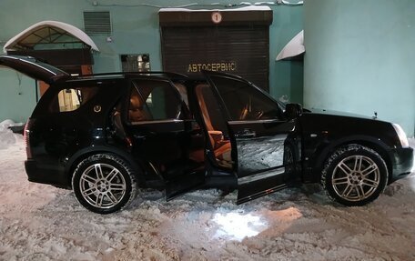 Cadillac SRX II рестайлинг, 2009 год, 750 000 рублей, 3 фотография