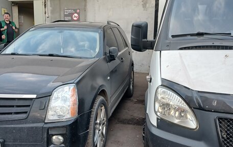Cadillac SRX II рестайлинг, 2009 год, 750 000 рублей, 13 фотография
