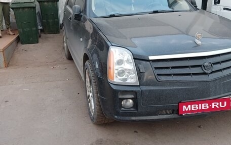 Cadillac SRX II рестайлинг, 2009 год, 750 000 рублей, 15 фотография