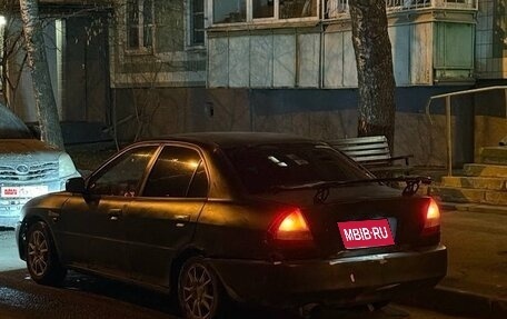 Mitsubishi Mirage VI рестайлинг, 1998 год, 190 000 рублей, 1 фотография