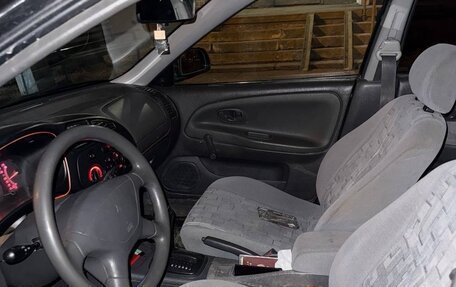 Mitsubishi Mirage VI рестайлинг, 1998 год, 190 000 рублей, 6 фотография