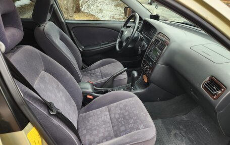 Toyota Avensis III рестайлинг, 2001 год, 810 000 рублей, 29 фотография