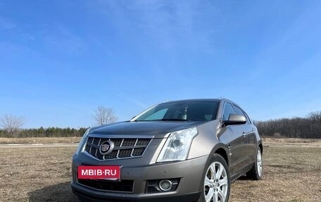 Cadillac SRX II рестайлинг, 2011 год, 1 200 000 рублей, 1 фотография