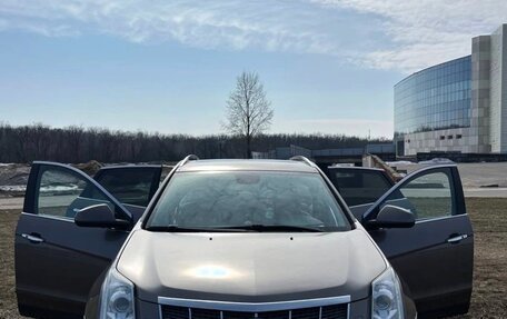 Cadillac SRX II рестайлинг, 2011 год, 1 200 000 рублей, 12 фотография