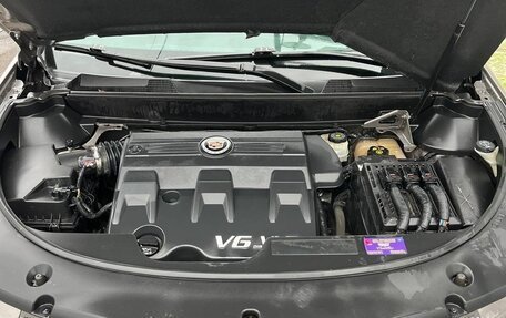 Cadillac SRX II рестайлинг, 2011 год, 1 200 000 рублей, 21 фотография