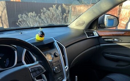 Cadillac SRX II рестайлинг, 2011 год, 1 200 000 рублей, 24 фотография