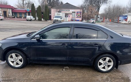 Volkswagen Jetta VI, 2011 год, 849 999 рублей, 3 фотография