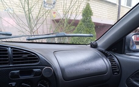 Mitsubishi Colt VI рестайлинг, 1998 год, 110 000 рублей, 9 фотография