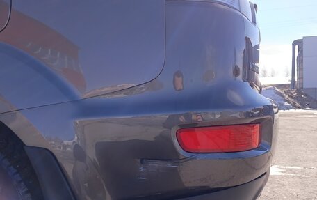 Mitsubishi Outlander III рестайлинг 3, 2010 год, 750 000 рублей, 8 фотография