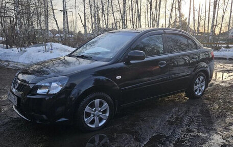 KIA Rio II, 2011 год, 650 000 рублей, 3 фотография