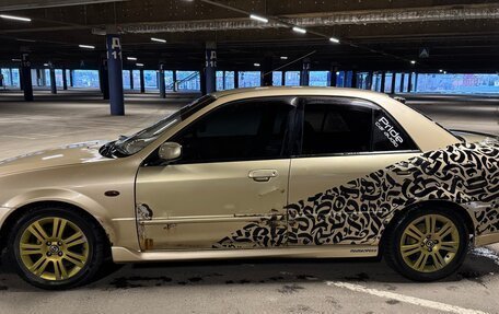 Mazda Familia, 2000 год, 450 000 рублей, 5 фотография