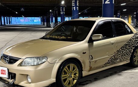 Mazda Familia, 2000 год, 450 000 рублей, 4 фотография